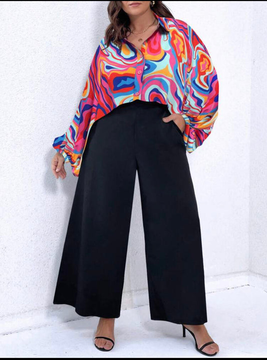 Introducing the must-have outfit of the season: our Plus Graphic Print Batwing Sleeve Shirt paired with effortlessly chic Black Wide Leg Pants.