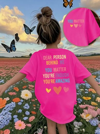 Short-sleeve t-shirt features a colourful and inspiring message for the person behind you