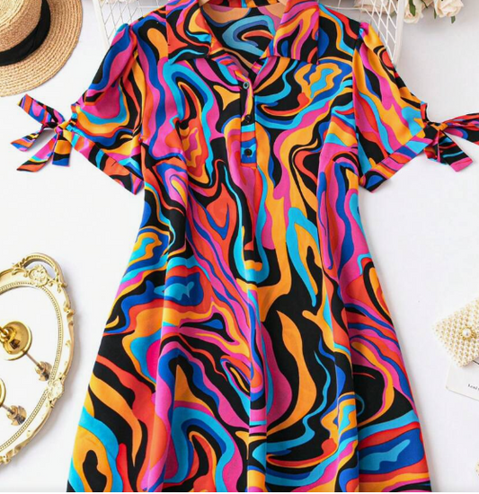 Get ready to turn heads in our gorgeous Plus Size Allover Print Knot Cuff Dress!