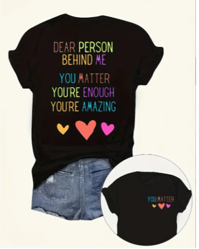 Short-sleeve t-shirt features a colourful and inspiring message for the person behind you